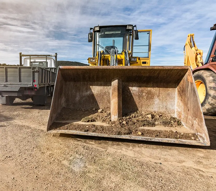 Wheel Loader with work truck and backhoe loader
